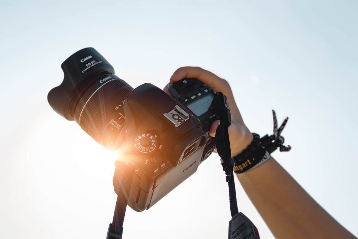 Hands holding a camera